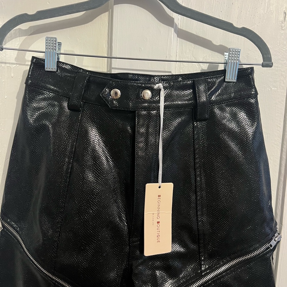 Black leather Beginning boutique festival pants that zip into shorts